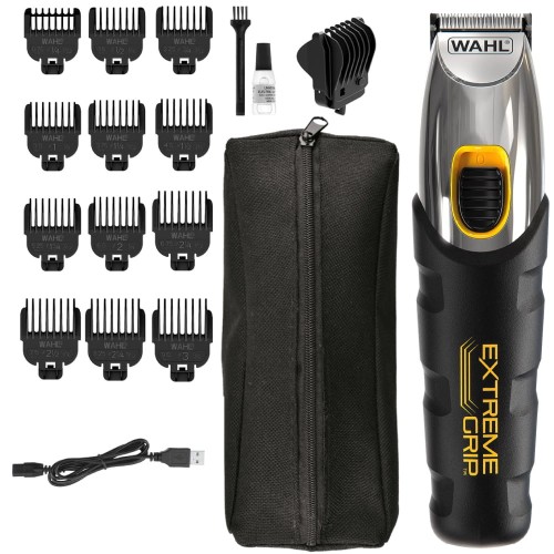 Kompletny zestaw pielęgnacyjny Wahl Extreme Grip z trymerem, ładowarką, nasadkami i praktycznym etui podróżnym.